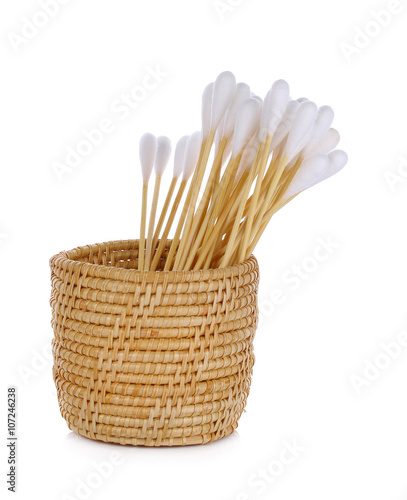 cotton bud in the basket on white background