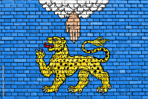 flag of Pskov painted on brick wall