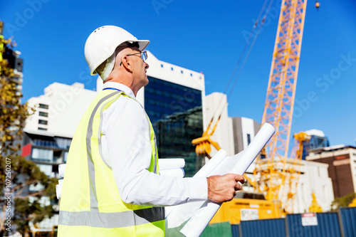 Engineer builder at construction site