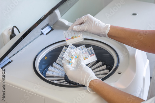 placing the samples in a centrifuge for controlling the quality of harvested blood