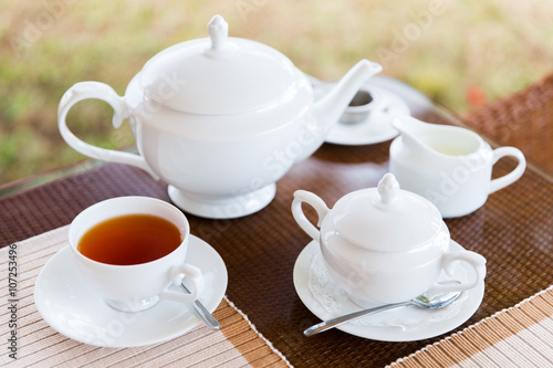 close up of tea service at restaurant or teahouse