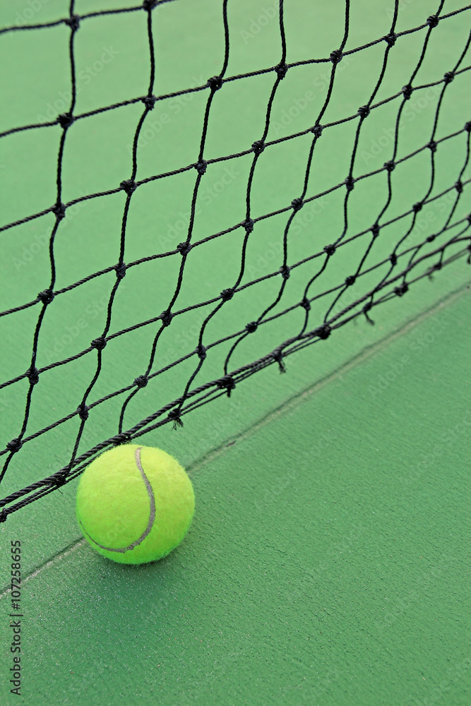 Tennis ball in net