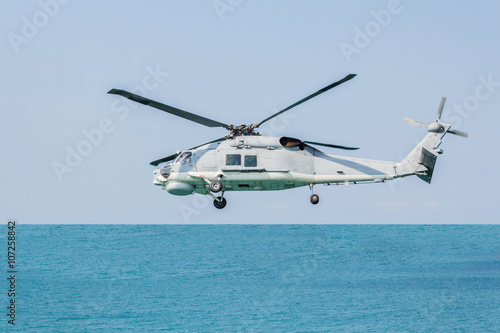 Helicopter flying over the sea