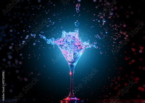Colourful cocktail in glass with splash