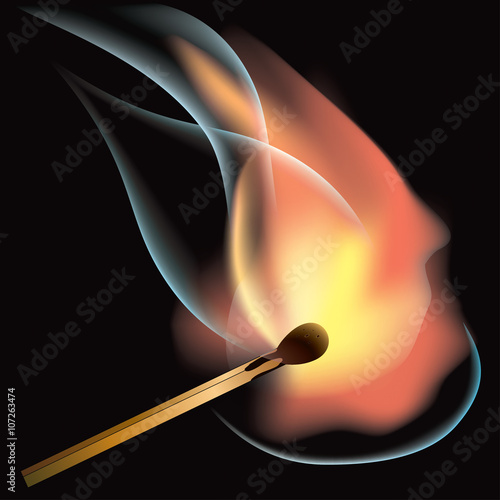 Burning match on a black background