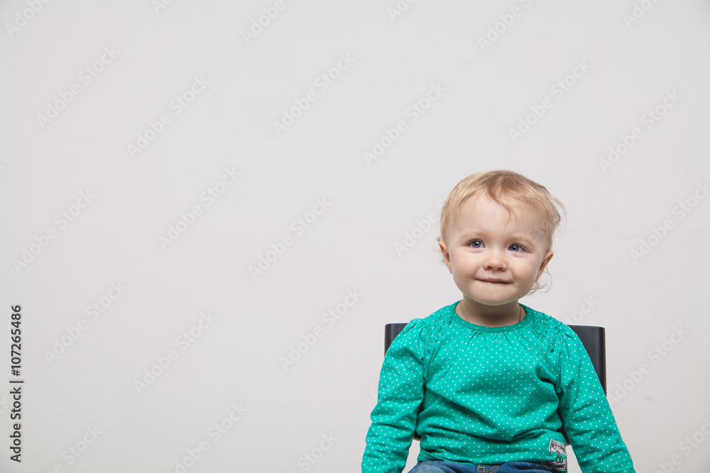Naklejka premium happy little girl a on white background