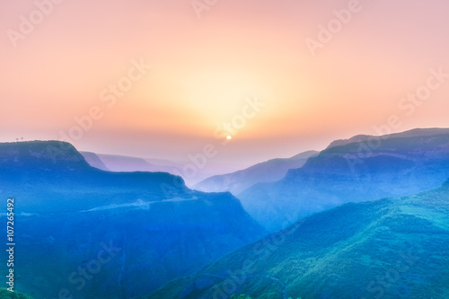 landscape with mountains and sky in sunset
