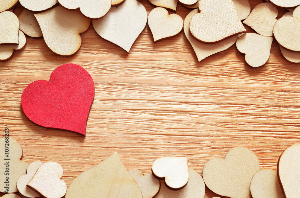 Obraz premium Wooden background of hearts