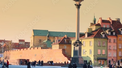 Old Town, Vasa Column,  Royal Castle in Warsaw is placed on the UNESCO's list of World Heritage Sites. March, 2016. Beautiful sunset over Warsaw's Old Town. photo