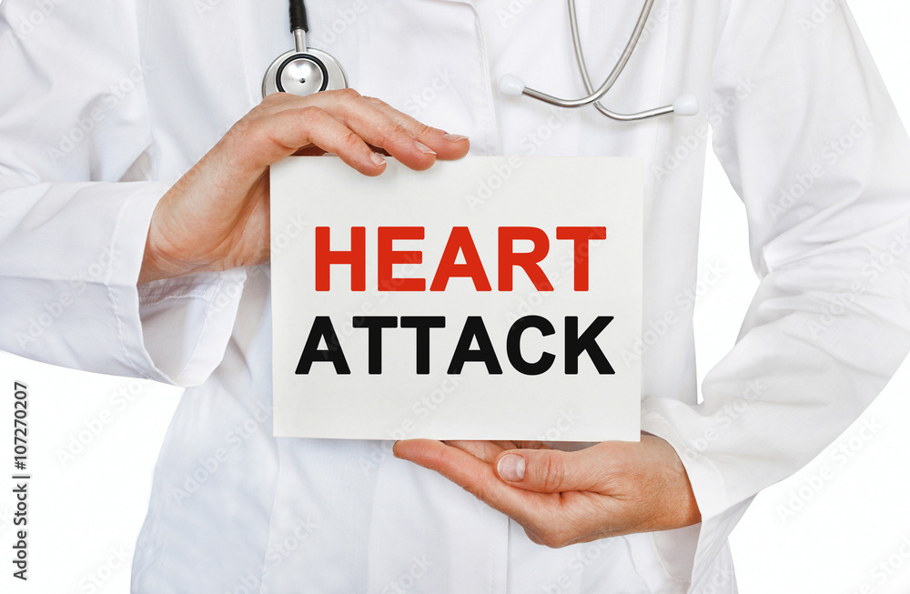 Heart Attack card in hands of Medical Doctor Heart Attack card in hands of Medical Doctor