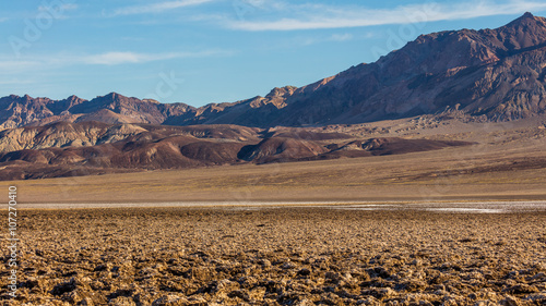 Fotografie Immense area of rock salt eroded by wind and rain into jagged spires