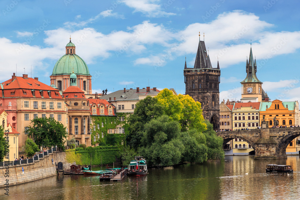 Obraz premium PRAGUE, CZECH REPUBLIC. View of the Vltava river , buildings and The Charles Bridge