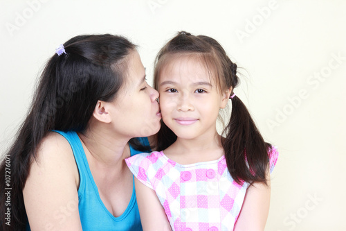 Beautiful pregnant woman and her daughter