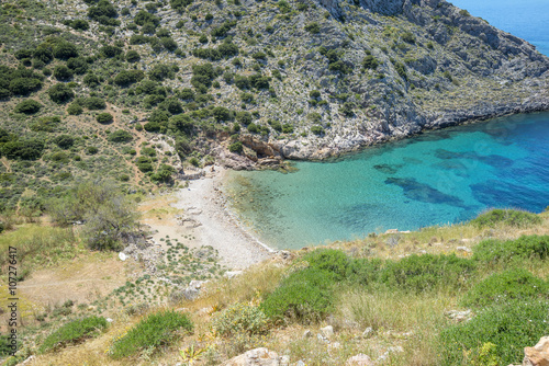 Sandy beach in Syros island, Cyclades, Greece. Crystal clear wat