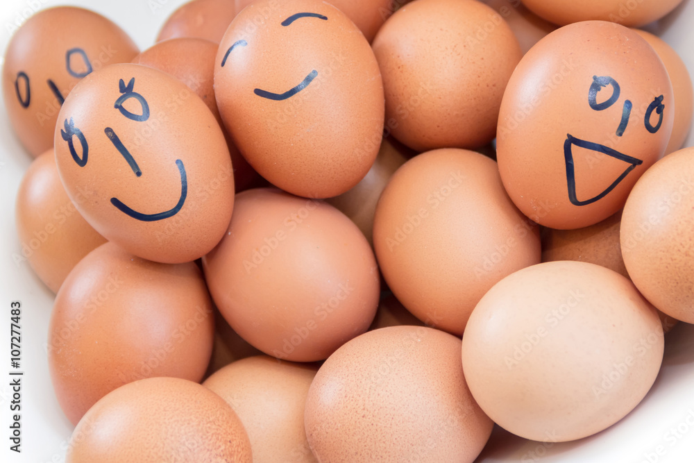 Draw a smile, background of fresh eggs for sale at a market.
