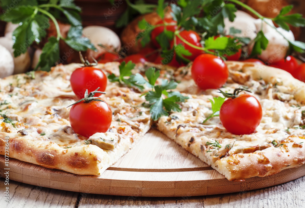 Vegetarian pizza with mushrooms, cheese and tomatoes, selective Vegetarian pizza with mushrooms, cheese and tomatoes, selective