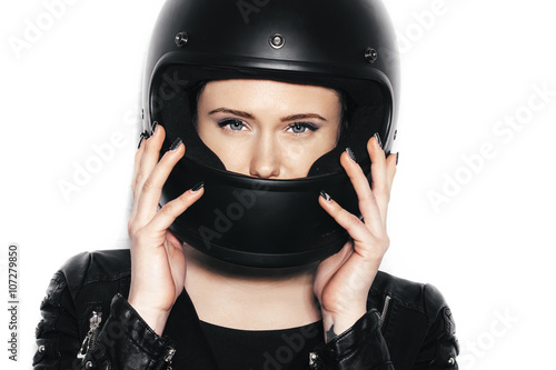 portrait of young beautiful woman in biker helmet © Kaponia Aliaksei