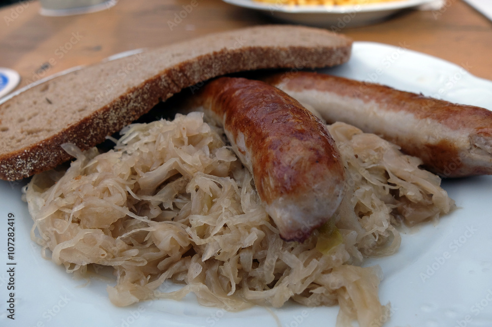 fränkische Bratwürste mit Sauerkraut und Brot Stock Photo | Adobe Stock