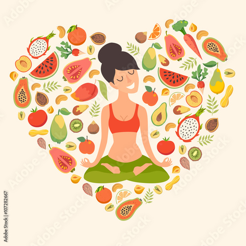 Beautiful girl in the lotus position on the background of the fruit in the form of heart pattern. The design concept of healthy food, vegetarianism, yoga, fitness