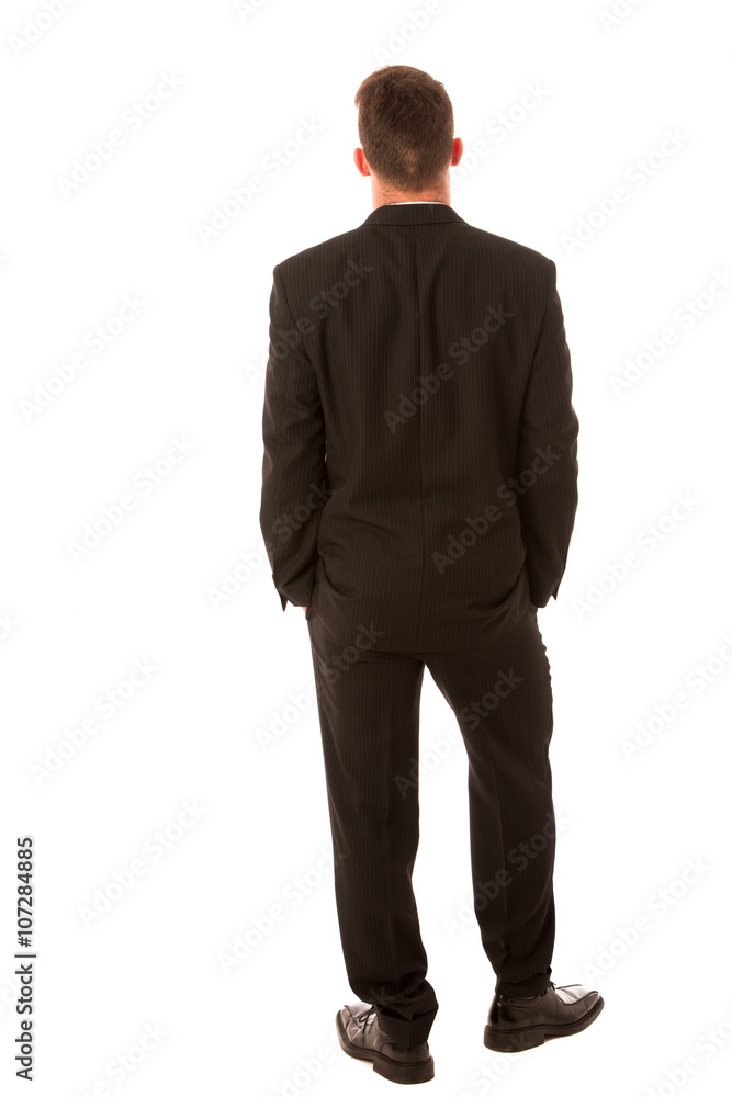 Successful businessman in formal suit confidently standing isola Successful businessman in formal suit confidently standing isola