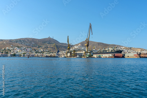 Entering the port of Syros, Cyclades. Panoramic view of the trad