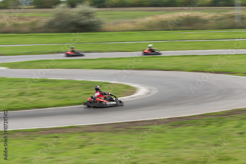 Super kart racing team. The racer on carting. Two Races on carting. © melnikofd