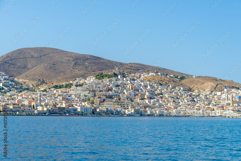 Entering the port of Syros, Cyclades. Panoramic view of the trad