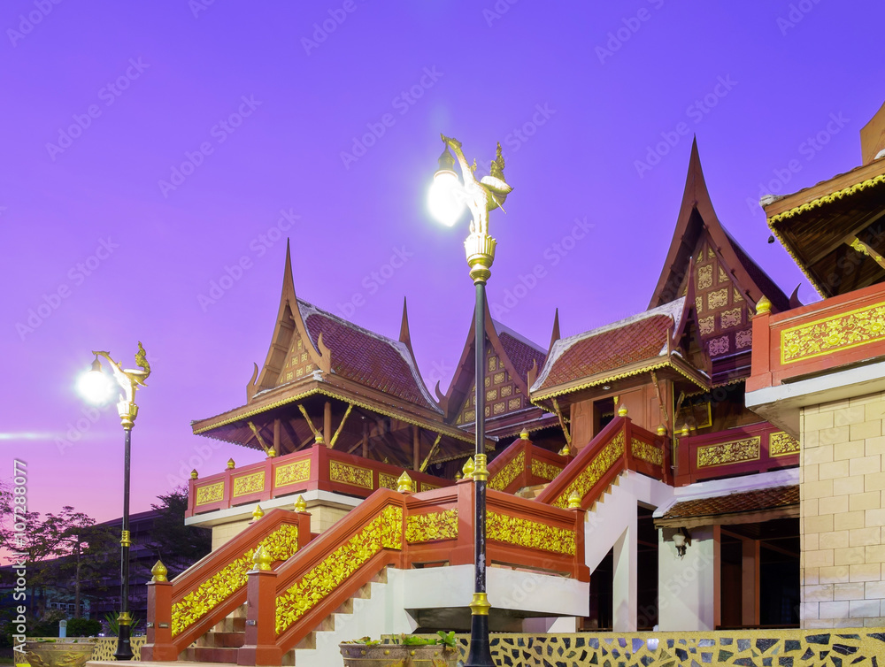 Fototapeta premium Thai style pavilion / Traditional wooden Thai style pavilion at twilight, Wat pho Thong, Bangkok, Thailand.
