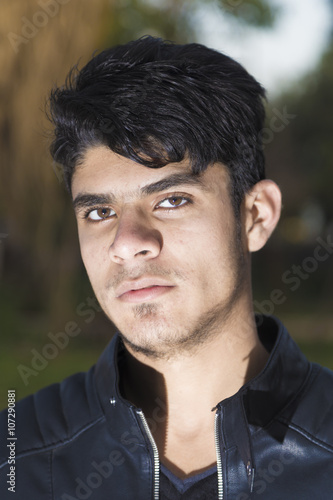 Portrait of Iraqi Brunette boy inside national park