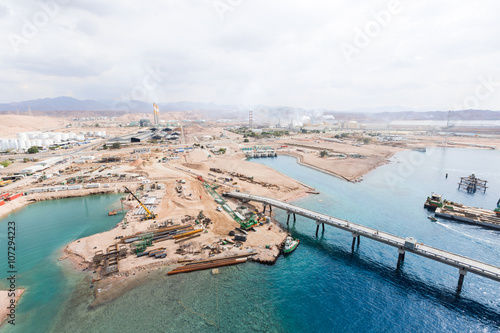 Aqaba, Jordan, 10/10/2015, Metal and concrete Jetty foundation construction at the Aqaba new port photographed from above