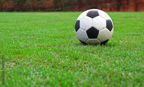 Football on green grass © phaitoon
