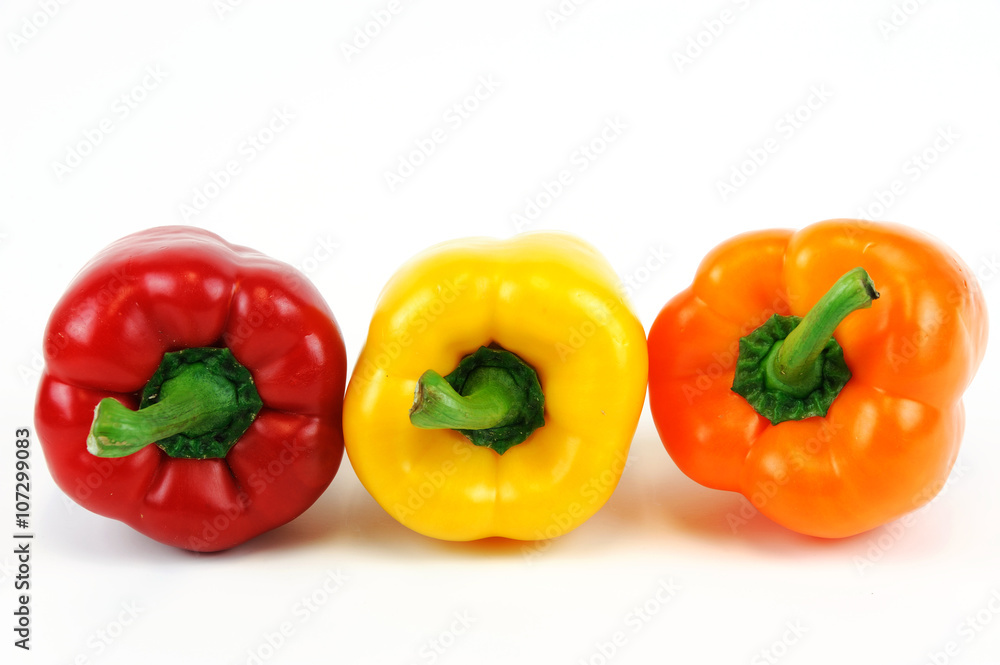 colorful peppers isolated on white background colorful peppers isolated on white background