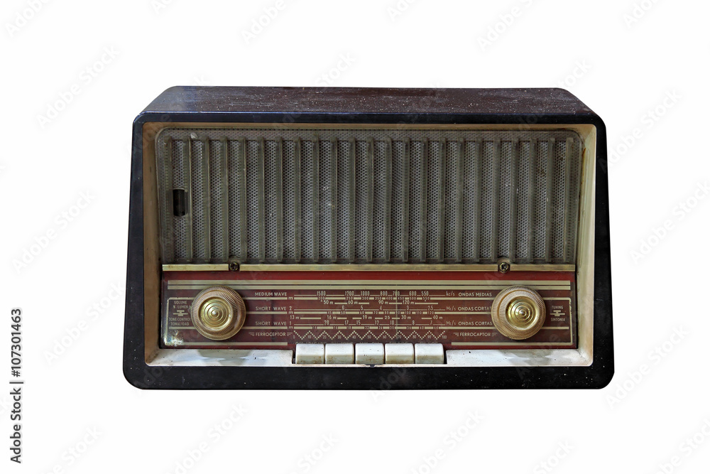 Grungy retro wooden radio on isolated white background Grungy retro wooden radio on isolated white background