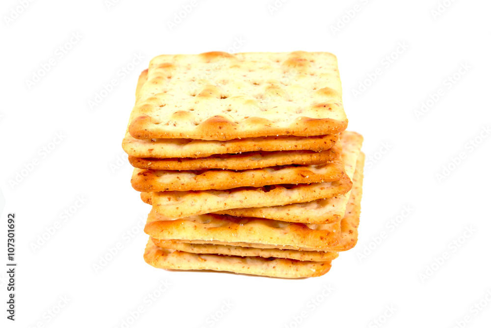 Pile of flour crackers with sugar isolated on a white background Pile of flour crackers with sugar isolated on a white background