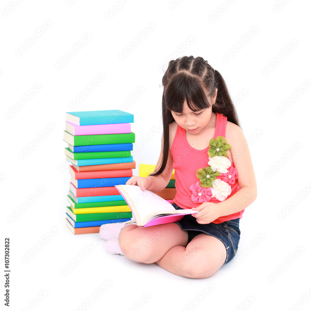Student little asian girl reading the book Student little asian girl reading the book