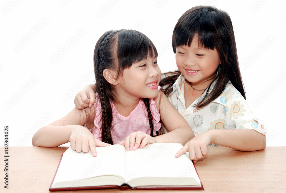 Intelligent little girl reading a book Intelligent little girl reading a book
