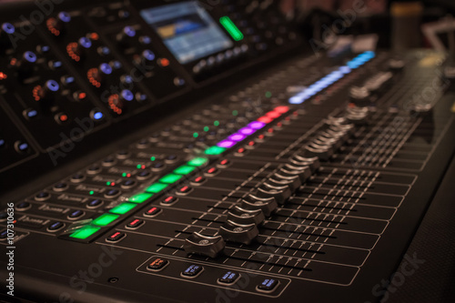 Mixer of a team that is responsible for controlling the audio system. © beerphotographer