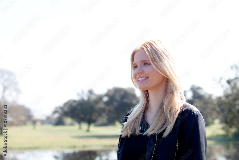 Blonde girl enjoying of good time at spring Blonde girl enjoying of good time at spring