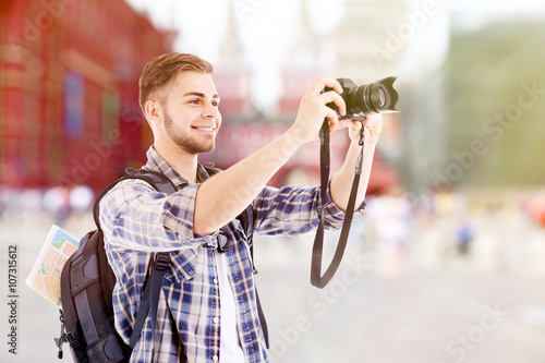 Traveler with camera  outside