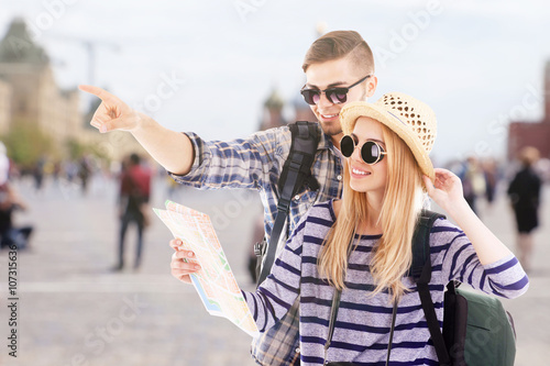Young couple of travelers i...
