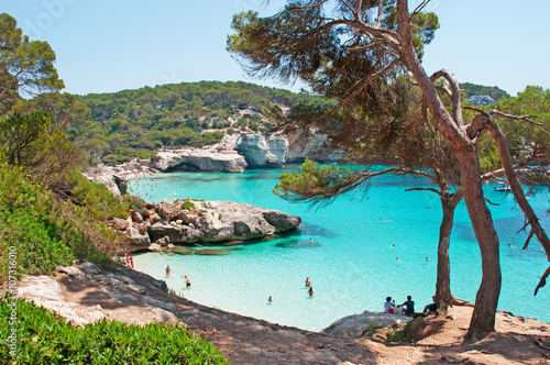 Minorca, isole Baleari, Spagna: la spiaggia di Cala Mitjaneta con Cala Mitjana sullo sfondo il 7 luglio 2013 photo