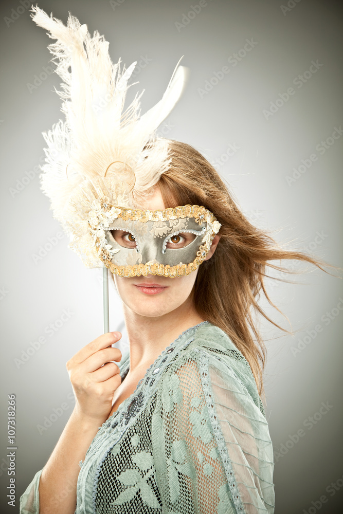 beautiful blonde girl with old carnival mask isolated on grey - obrazy, fototapety, plakaty 