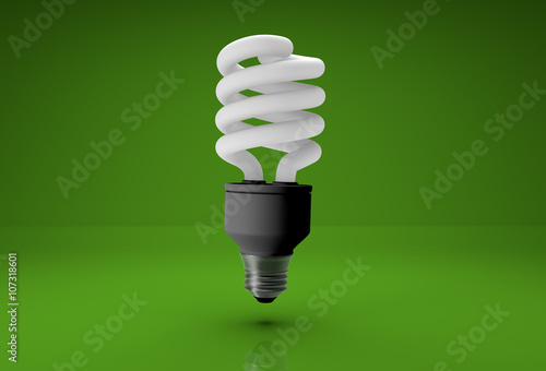 3d energy saving bulb on green background