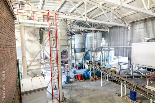 Concrete mixing tanks with transporter at factory