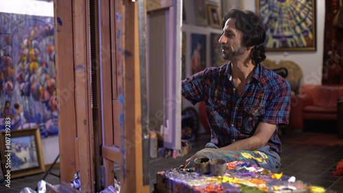 Flour creativity. Artist process of painting a picture