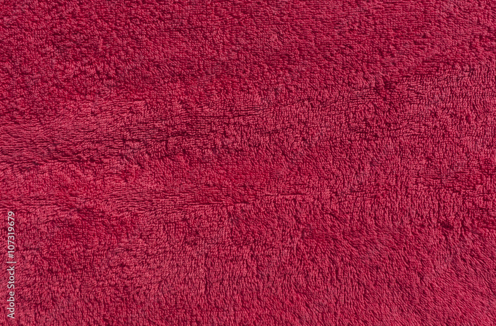 Fototapeta premium Red cotton bath towel background.