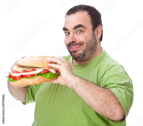 fat funny man eat a huge sandwich isolated on white