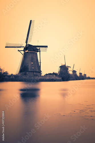 Windmill in Netherlands at sunset