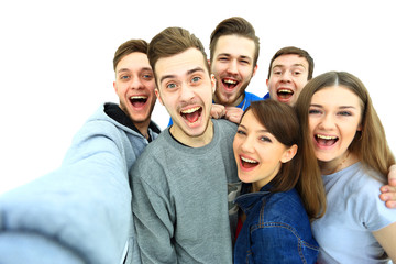 Group of happy young teenager students taking selfie photo isolated on white background