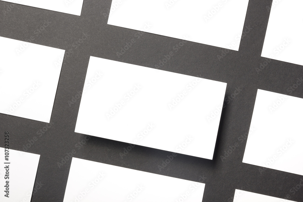 Business card blank over office table. Corporate stationery branding mock-up Business card blank over office table. Corporate stationery branding mock-up